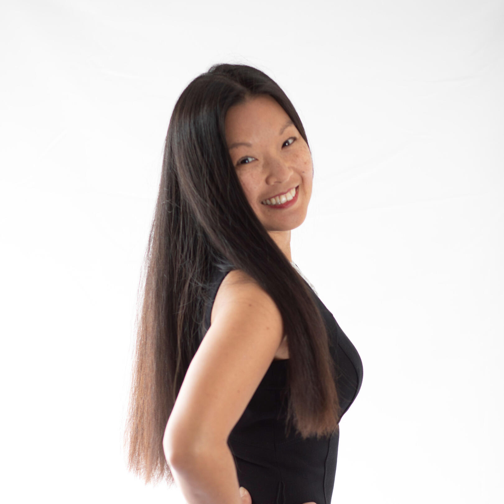 women facing back right corner turning towards the front